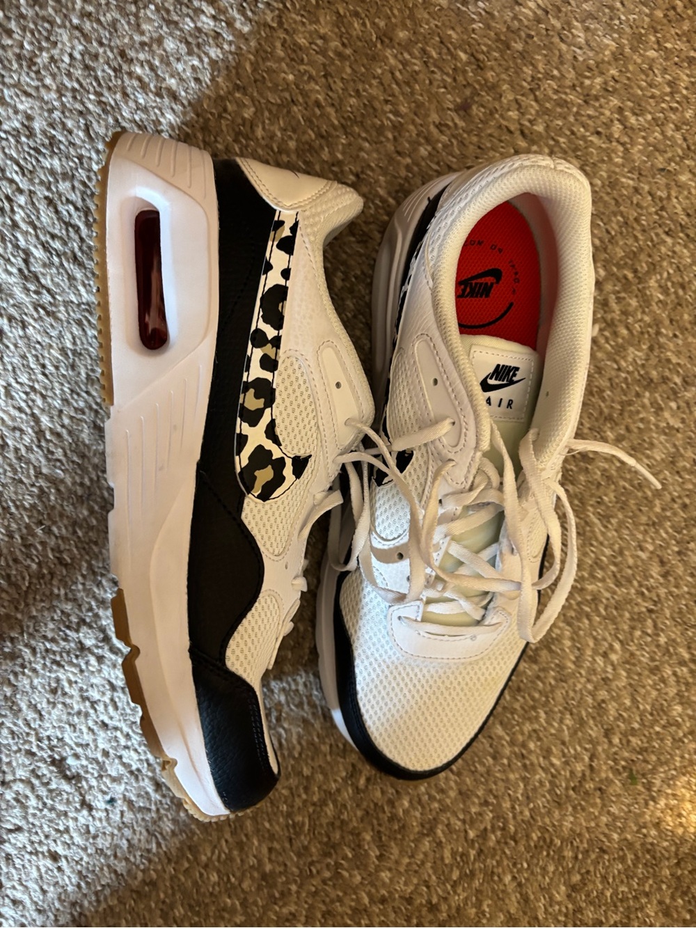 Nike W10 Women's White and Black Athletic Sneakers with Leopard Swoosh